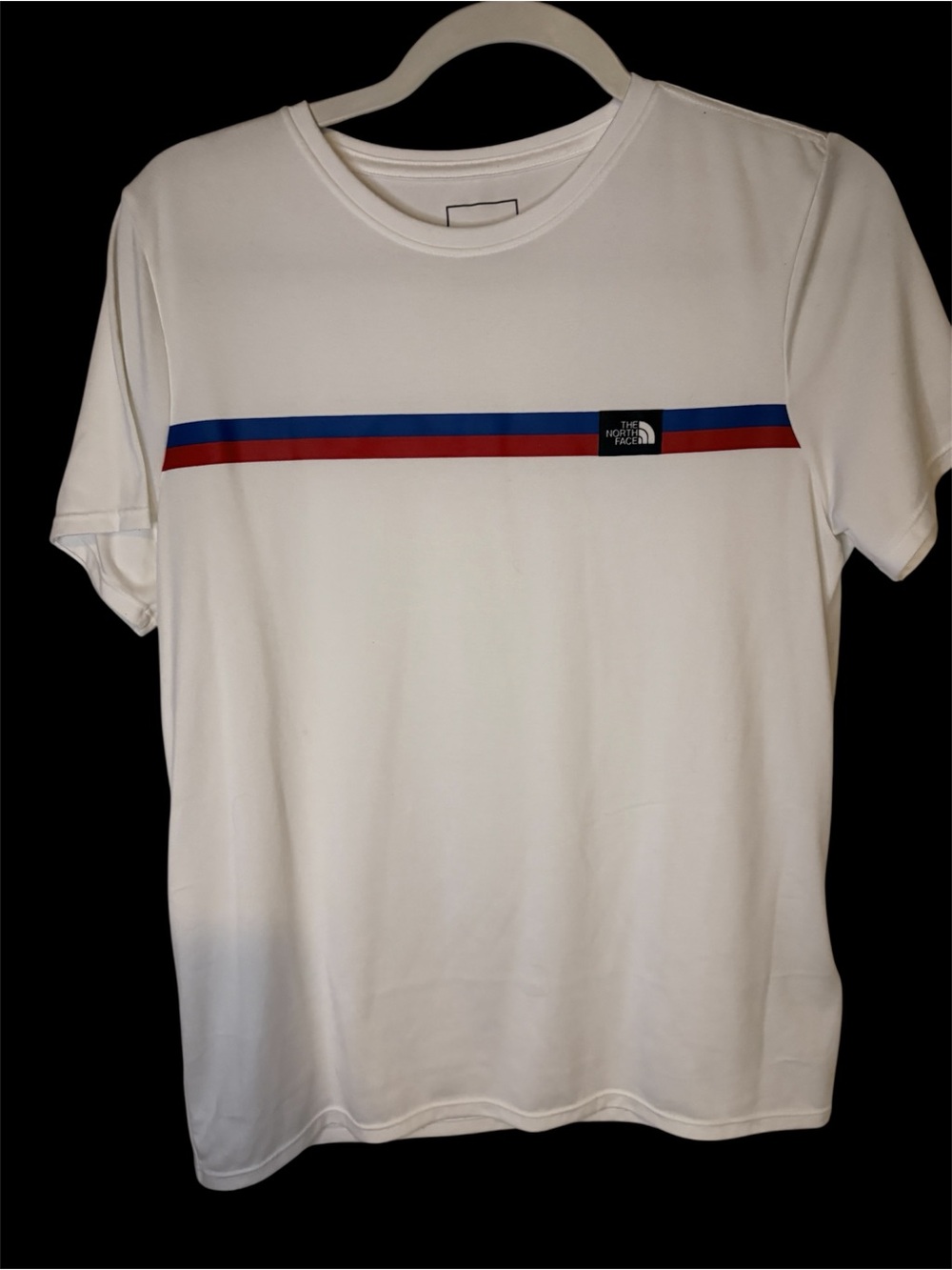 The North Face Reaxion Liberty short sleeve top.